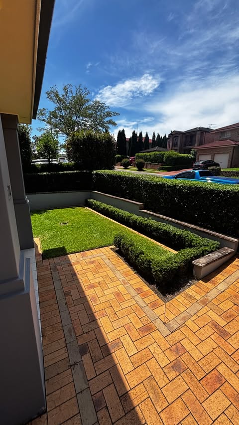 Freshly hedged and paved front yard, completed by Longford Property Maintenance in Kings Langley